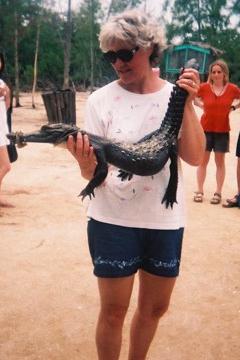Brenda holding an alligator - 16Kb
