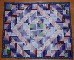 lilac and beige quilt